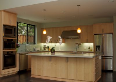 Redwood House kitchen with blond wood cabinetry
